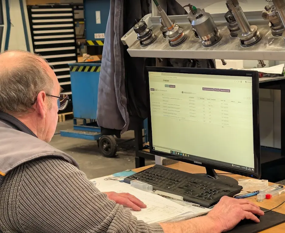 Manufacturing workshop illustrating dynamic project budget dashboards