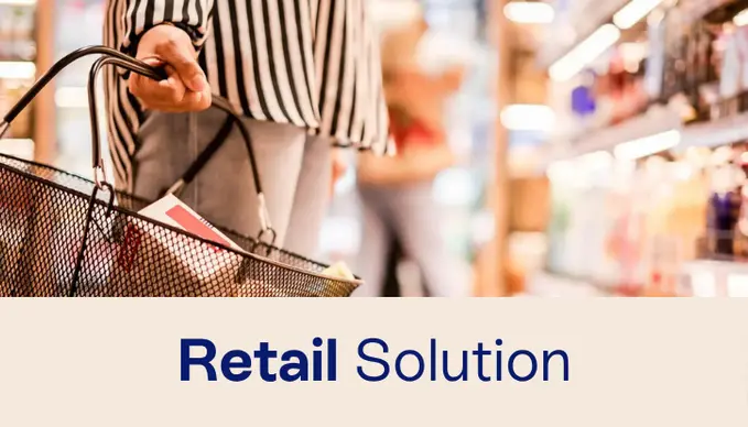 A person holding a shopping basket in an Omnichannel ERP environment.