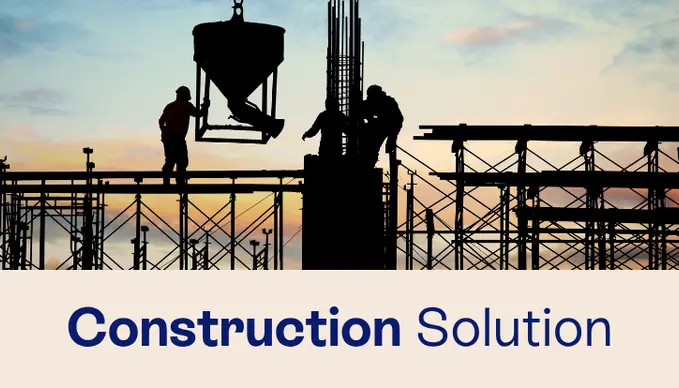 An engineer working on a construction site in a Construction ERP system to manage projects.