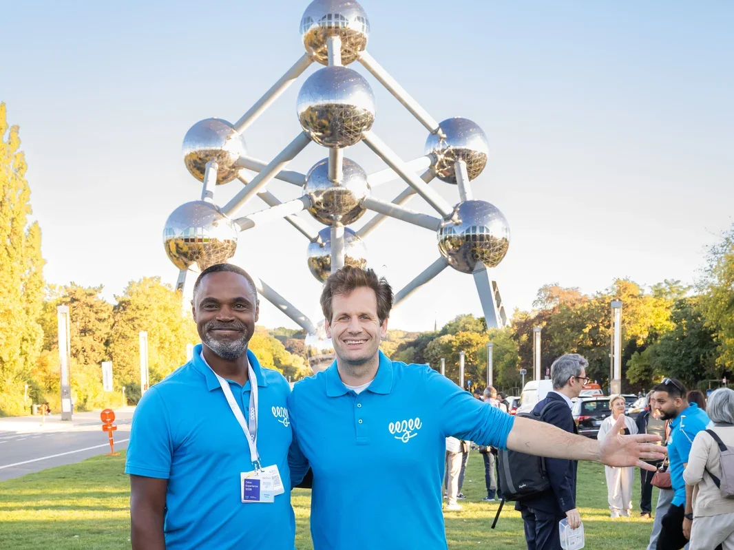 Christian Tekem and Arnaud Thomée in front of the Atomium in Brussels